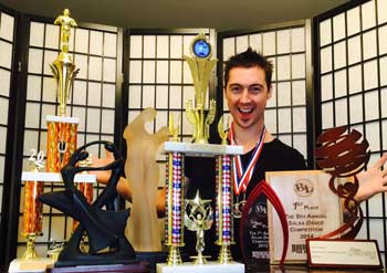 Danny Kalman With Trophies - World Latin Dance Cup